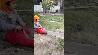 Bubu play on a seesaw...