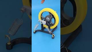 Flywheel Regenerating Energy From Spring Mechanism
