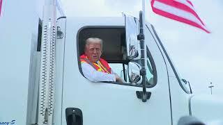 Donald Trump arrives to rally in a garbage truck