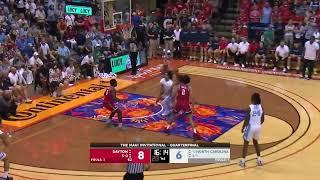 NCAA March Madness - Elliot Cadeau pins it off the backboard and it turns into a Seth Trimble triple