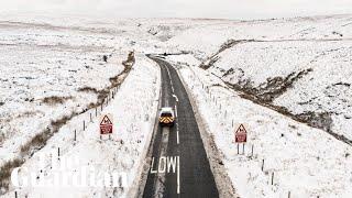 Snowfall across the UK causes school closures and travel disruptions