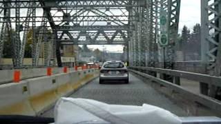 Driving bridge over Delaware River dividing New Jersey and Pennsylvania enterring Milford PA