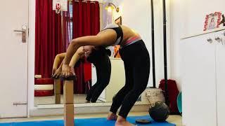 How to practice standing Chakrasana?