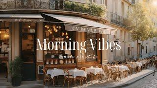 You are reading a book and waiting for someone in a Parisian Café in a romantic morning 