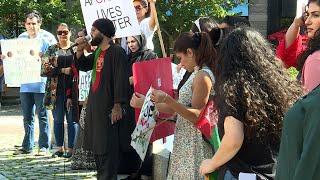 Members of Maine's Afghan community rally in Portland