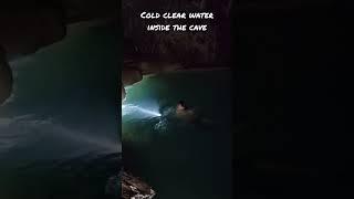 Cold clear water inside the cave.