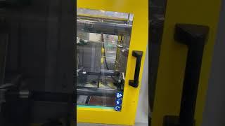 Plastic Injection Moulding Machine in action - Dudley Associates Ltd