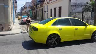 Cars in Havana Cuba 2016 . Yellow Audi .