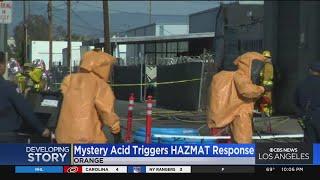 Mystery acid spill in Orange triggers HAZMAT response