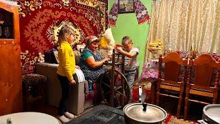 Cozy Life in the Carpathians: Grandma Spins Wool and Bakes Pies for Her Grandkids