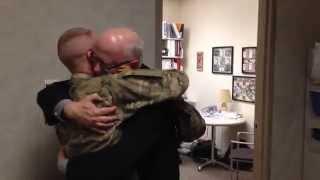 Dad breaks down when son returns home early from Afghanistan