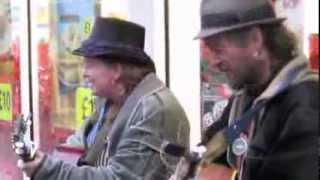 The Kinks' Dave Davies catches street busker act Laura and Pixi do Stray Cat Strut