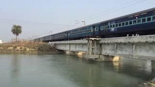 Humming EMD leads 12558 Sapt Kranti Express across Upper Ganga Canal