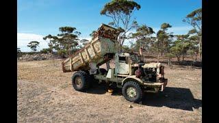 Old Euclid Mine truck, antique farm equipment, international trucks and an old  dozer in wheatbelt.