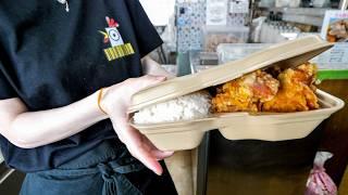 A young woman makes a fried roadside Take-out store