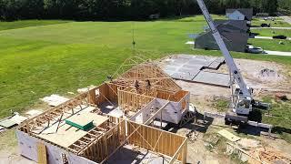 DronEye look from the Air Setting Trusses on house in Wilson