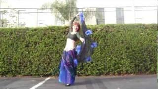 Exotic veil, sparkly petal skirt. Ameynra belly dance training - Sofia Goldberg of Ameynra company