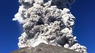 Volcano erupts as campers cook breakfast at the foot of Mount Merapi