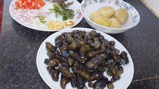 River snails with potato curry  Lai tharoi aloo thongba