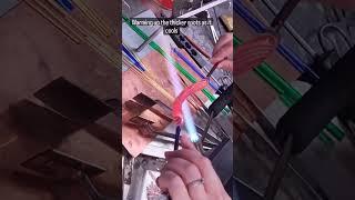 pulling some lampwork twist glass cane