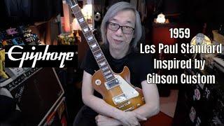 I played this..and I liked it!! The Epiphone (Inspired by Gibson Custom) 1959 Les Paul Standard.