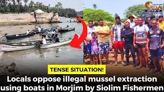 Locals oppose illegal mussel extraction using boats in Morjim by Siolim Fishermen.