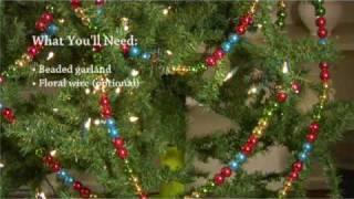 Decorating a Tree with Beaded Garland