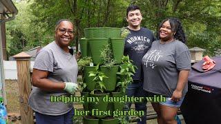 Helping my daughter setup her first garden