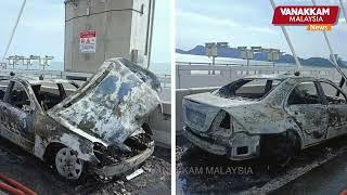 Mercedes bursts into flames after colliding with car battery,5km traffic jam at 2nd Penang Bridge