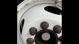 Cleaning dirty RV wheels and tires with black magic products