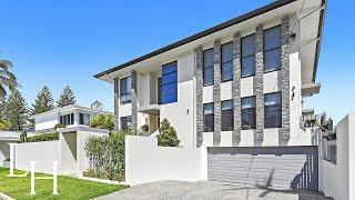 Inside a $7,000,000 waterfront home on the Gold Coast, Australia with a Private Beach