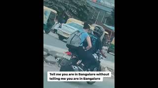 Just Bengaluru things! Woman seen using laptop on moving bike