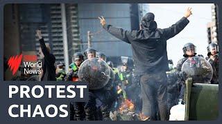 Protesters clash with police during an anti-war rally in Melbourne