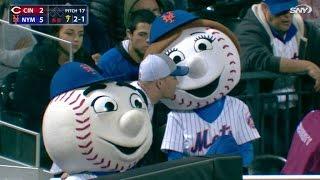 CIN@NYM: A fan tries to steal a kiss from Mrs. Met