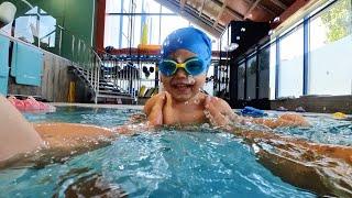 Baby Put on the Swimming Hat For The First Time