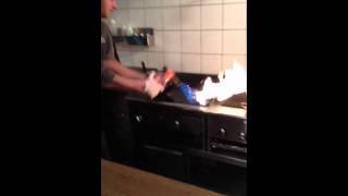 This is how you make chicken wings.... with a blowtorch!