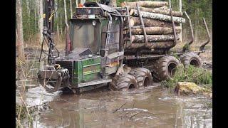 Forwarder Mini Bruunett logging in wet forest