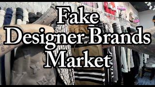 Fake Designer Market. Summer Luxury Clothes And Outfits In Guangzhou China.