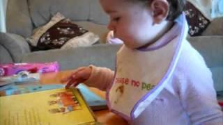 Breanna reading to mummy