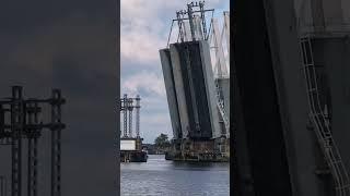 Raising a railway bridge to allow ships to pass in Holland