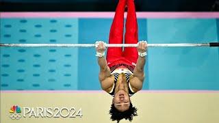 Japan's Shinnosuke Oka rises on high bar for third gold medal of the Paris Olympics | NBC Sports