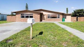 2435 NW 160 Street, Miami Gardens, Florida Presented by Marian Meyers.