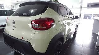 Nuevo - Así se ve el exterior de una Renault Kwid Outsider de color blanco marfil bitono.