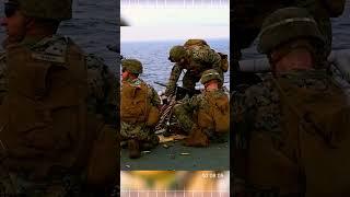 U.S. Marines with Marine Expeditionary Unit fire M2 .50-caliber machine guns aboard the Wasp.