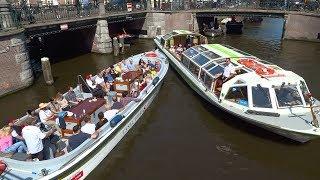 Chaos grachten Amsterdam: boem, bootje hozen, roer kapot, brug te laag en meerrr