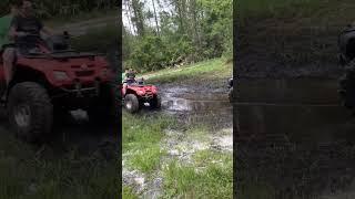 can am splashes honda with mud