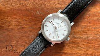 Paul Gerber's  Cal  41 - a wristwatch with switchable jumping/permanent seconds and triple rotors