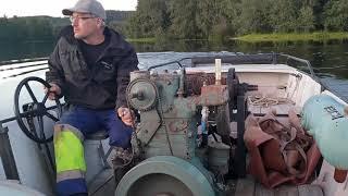 Unique one cylinder diesel boat engine starting up