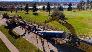 Installing big water pipes in northwest Denver.