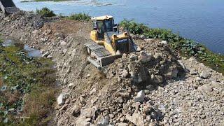 Amazing road building mighty machines bulldozer pushing rock and soil-truck unloading rock and soil